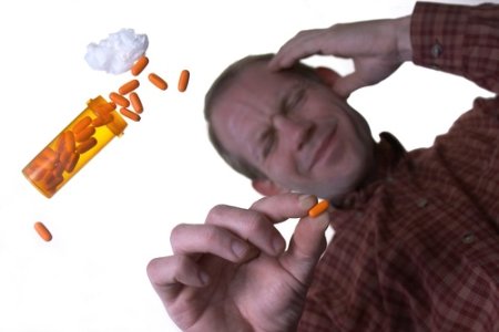 man taking pills
